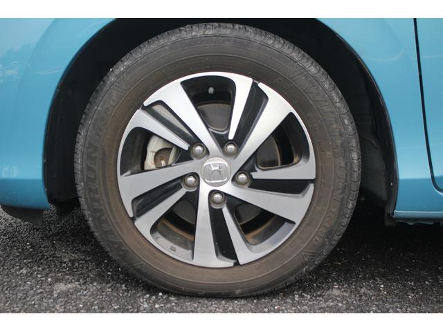 フリード＋ハイブリッド ハイブリッドＥＸ　純正９インチナビ　禁煙車　フルセグＴＶ　純正フリップダウンモニター　ＬＥＤヘッドライト　両側電動スライドドア　バックカメラ　シートヒーター　ハーフレザーシート　衝突軽減ブレーキ　レーンアシスト（29枚目）