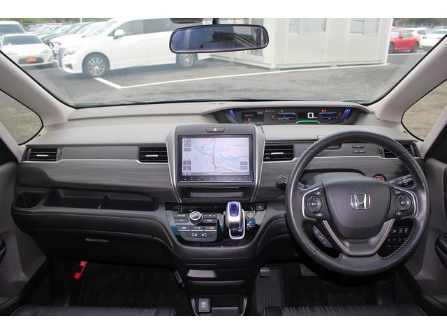 フリード＋ハイブリッド ハイブリッドＥＸ　純正９インチナビ　禁煙車　フルセグＴＶ　純正フリップダウンモニター　ＬＥＤヘッドライト　両側電動スライドドア　バックカメラ　シートヒーター　ハーフレザーシート　衝突軽減ブレーキ　レーンアシスト（45枚目）