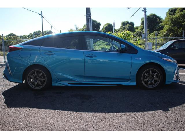 プリウスPHV Aプレミアム モデリスタエアロ 純正11.6型ナビ 禁煙車 バックカメラ フルセグTV 温熱黒革シート ETC ハンドルヒーター 衝突軽減システム 電動シート ブラインドスポットモニター クルーズコントロール(5枚目)