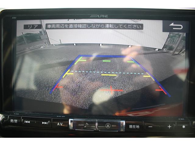 ノア Si フリップダウンモニター 禁煙車 アルパイン9型ナビ バックカメラ フルセグTV 両側電動スライドドア 黒半革シート ETC クルーズコントロール 衝突軽減ブレーキ LEDヘッドライト 7人乗り(5枚目)