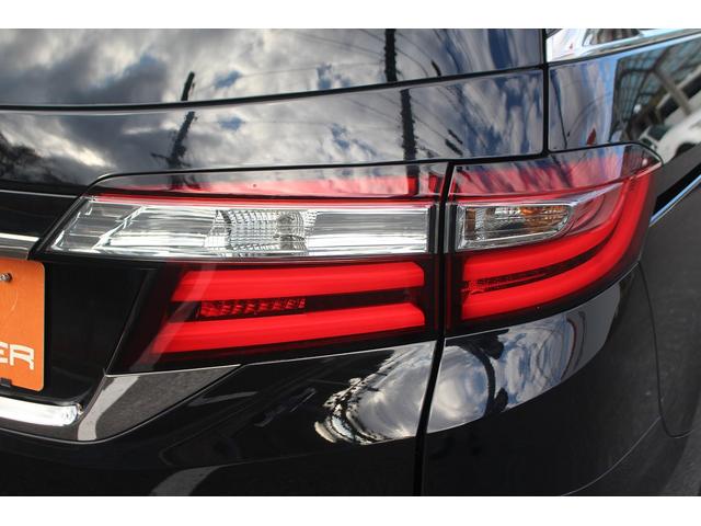 オデッセイハイブリッド ハイブリッドアブソルート・ＥＸホンダセンシング　禁煙車　後席モニター　純正９型ナビ　フルセグテレビ　バックカメラ　黒革シート　両側電動スライドドア（20枚目）