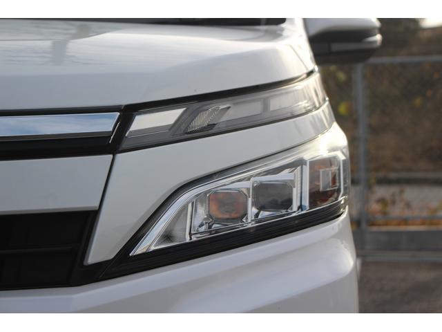 ヴォクシー ハイブリッドＶ　後期型　禁煙車　フリップダウンモニター　アルパインナビ　両側電動スライドドア　フルセグＴＶ　バックカメラ　　温熱シート　ＬＥＤヘッドライト　ＥＴＣ　クルーズコントロール　プッシュスタート（18枚目）