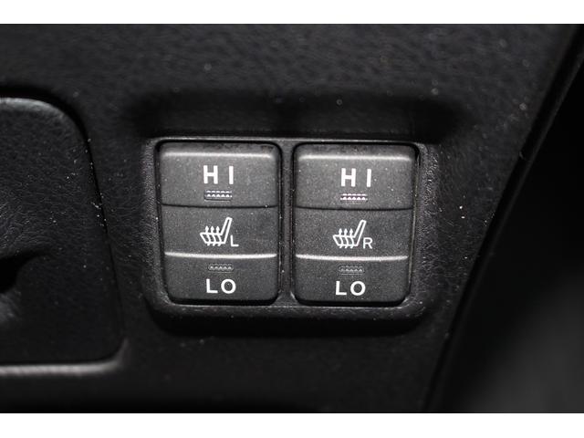 ヴォクシー ハイブリッドＶ　後期型　禁煙車　フリップダウンモニター　アルパインナビ　両側電動スライドドア　フルセグＴＶ　バックカメラ　　温熱シート　ＬＥＤヘッドライト　ＥＴＣ　クルーズコントロール　プッシュスタート（70枚目）