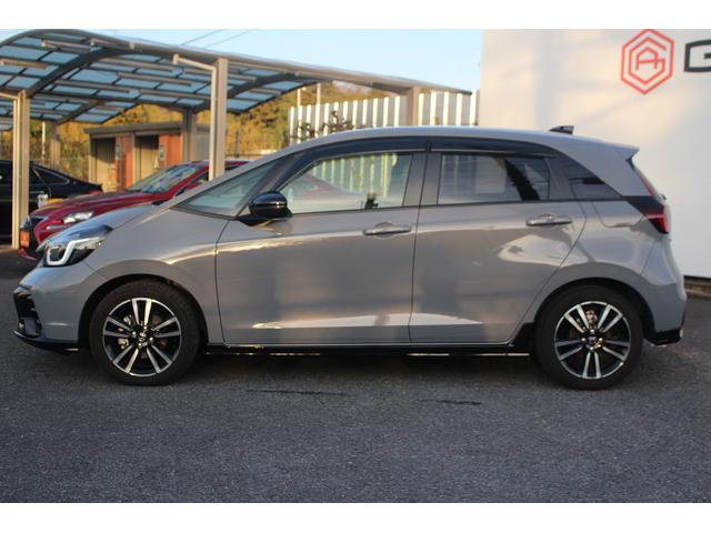 フィット ｅ：ＨＥＶ　ＲＳ　後期型　禁煙車　純正９型ナビ　フルセグＴＶ　バックカメラ　ハーフレザーシート　ＬＥＤヘッドライト　レーダークルーズコントロール　純正１６インチホイール　ＥＴＣ　衝突軽減ブレーキ　Ｂｌｕｅｔｏｏｔｈ接続（14枚目）