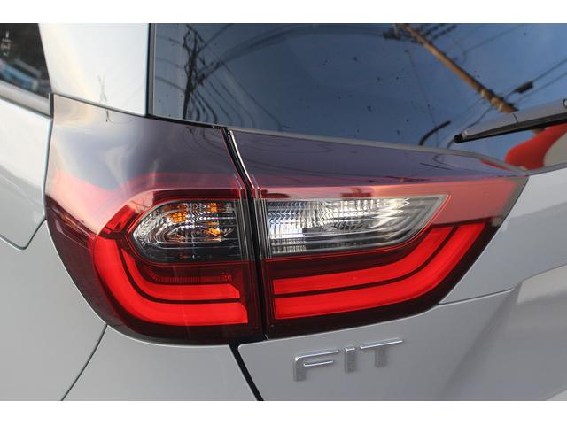 フィット ｅ：ＨＥＶ　ＲＳ　後期型　禁煙車　純正９型ナビ　フルセグＴＶ　バックカメラ　ハーフレザーシート　ＬＥＤヘッドライト　レーダークルーズコントロール　純正１６インチホイール　ＥＴＣ　衝突軽減ブレーキ　Ｂｌｕｅｔｏｏｔｈ接続（21枚目）