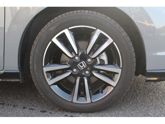 フィット ｅ：ＨＥＶ　ＲＳ　後期型　禁煙車　純正９型ナビ　フルセグＴＶ　バックカメラ　ハーフレザーシート　ＬＥＤヘッドライト　レーダークルーズコントロール　純正１６インチホイール　ＥＴＣ　衝突軽減ブレーキ　Ｂｌｕｅｔｏｏｔｈ接続（26枚目）