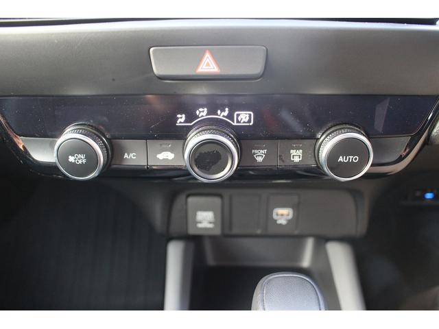 フィット ｅ：ＨＥＶ　ＲＳ　後期型　禁煙車　純正９型ナビ　フルセグＴＶ　バックカメラ　ハーフレザーシート　ＬＥＤヘッドライト　レーダークルーズコントロール　純正１６インチホイール　ＥＴＣ　衝突軽減ブレーキ　Ｂｌｕｅｔｏｏｔｈ接続（60枚目）