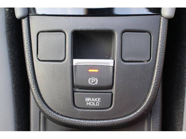 フィット ｅ：ＨＥＶ　ＲＳ　後期型　禁煙車　純正９型ナビ　フルセグＴＶ　バックカメラ　ハーフレザーシート　ＬＥＤヘッドライト　レーダークルーズコントロール　純正１６インチホイール　ＥＴＣ　衝突軽減ブレーキ　Ｂｌｕｅｔｏｏｔｈ接続（62枚目）