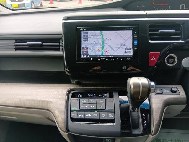 ステップワゴン Ｇホンダセンシング　ワンオーナー　ナビ　フルセグＴＶ　ＥＴＣ　バックカメラ　スマートキー　両側電動ドア　わくわくゲート　ホンダセンシング　整備記録簿　スマ－トキ－　クルコン　３列シート　パワーウインドウ　Ｒカメラ　ＶＳＡ（10枚目）