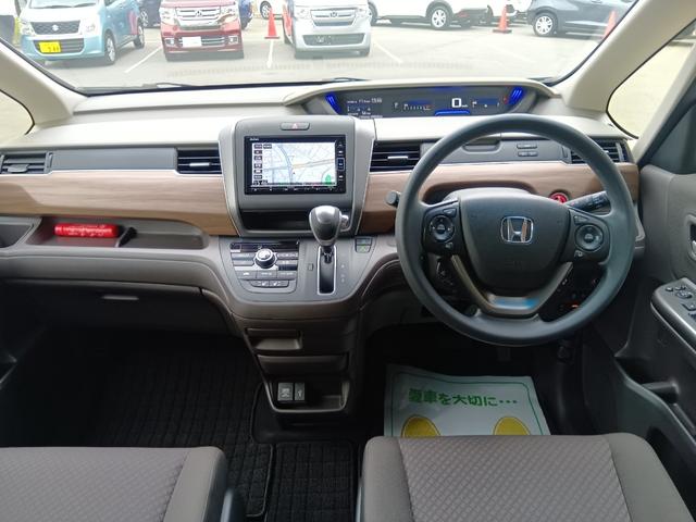 フリード Ｇ・ホンダセンシング　ワンオーナー　ナビ　ＴＶ　Ｒカメラ　両側電動スライド　ベンチシート　Ｆセグ　追突被害軽減ブレーキ　Ｗエアバッグ　パワーウィンドウ　１オ－ナ－　アクティブクルーズコントロール　スマートキ　整備点検記録簿（4枚目）