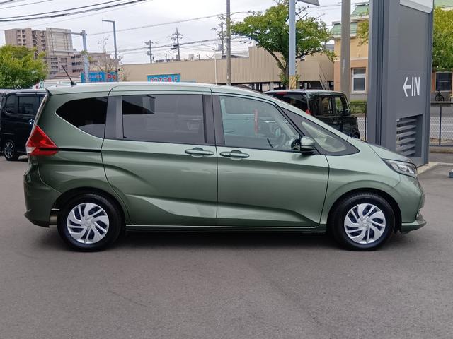 フリード Ｇ・ホンダセンシング　ワンオーナー　ナビ　ＴＶ　Ｒカメラ　両側電動スライド　ベンチシート　Ｆセグ　追突被害軽減ブレーキ　Ｗエアバッグ　パワーウィンドウ　１オ－ナ－　アクティブクルーズコントロール　スマートキ　整備点検記録簿（7枚目）
