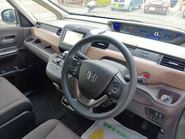 フリード Ｇ・ホンダセンシング　ワンオーナー　ナビ　ＴＶ　Ｒカメラ　両側電動スライド　ベンチシート　Ｆセグ　追突被害軽減ブレーキ　Ｗエアバッグ　パワーウィンドウ　１オ－ナ－　アクティブクルーズコントロール　スマートキ　整備点検記録簿（14枚目）