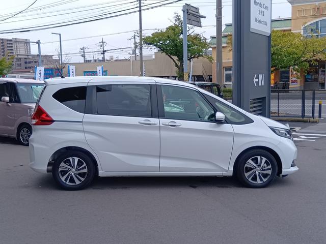 フリードハイブリッド ハイブリッド・Ｇホンダセンシング　ワンオーナー　ナビ　ＴＶ　Ｒカメラ　ルーフモニター　軽減ブレーキ　キーフリーシステム　１オ－ナ－　記録簿　サイドカーテンエアバック　後カメラ　Ａクルーズ　ＬＥＤヘッドランプ　横滑防止　ドライブレコーダ（7枚目）
