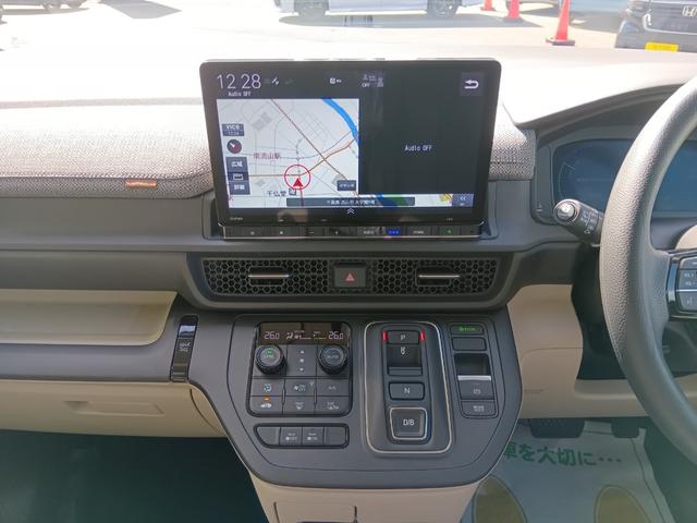 ステップワゴン e:HEVエアー ワンオーナー ナビ TV マルチカメラ 両側電動スライド 前後誤発進抑制 パワーステアリング 両側Pスライドドア 助手席エアバッグ 1オ-ナ- LEDヘッドランプ クルコン エアコン ABS ドラレコ(9枚目)