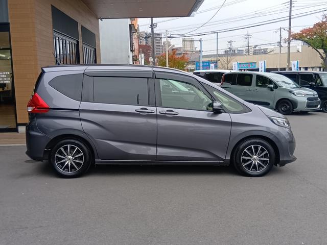 フリード Ｇ・ホンダセンシング　Ｗエアバッグ　パワーウィンドウ　１オ－ナ－　アクティブクルーズコントロール　スマートキ　カラーバックモニター　整備点検記録簿　ワンセグテレビ　ＶＳＡ　エアコン　キーレス　ＳＲＳ（7枚目）