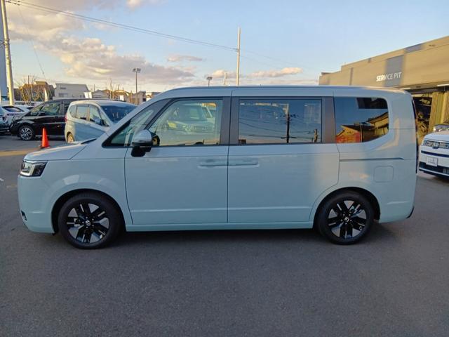 ステップワゴン ｅ：ＨＥＶエアーＥＸ　ワンオーナー　ナビ　フルセグＴＶ　ＥＴＣ　マルチビューカメラ　スマートキー　ＬＥＤライト　両側電動ドア　シートヒーター　パワーテールゲート　ホンダセンシング　バックカメラ　オートクルーズコントロール（7枚目）