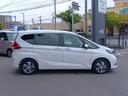 フリードハイブリッド ハイブリッド・Ｇホンダセンシング　ワンオーナー　ナビ　ＴＶ　Ｒカメラ　ルーフモニター　軽減ブレーキ　キーフリーシステム　１オ－ナ－　記録簿　サイドカーテンエアバック　後カメラ　Ａクルーズ　ＬＥＤヘッドランプ　横滑防止　ドライブレコーダ（7枚目）