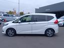 フリードハイブリッド ハイブリッド・Ｇホンダセンシング　ワンオーナー　ナビ　ＴＶ　Ｒカメラ　ルーフモニター　軽減ブレーキ　キーフリーシステム　１オ－ナ－　記録簿　サイドカーテンエアバック　後カメラ　Ａクルーズ　ＬＥＤヘッドランプ　横滑防止　ドライブレコーダ（8枚目）