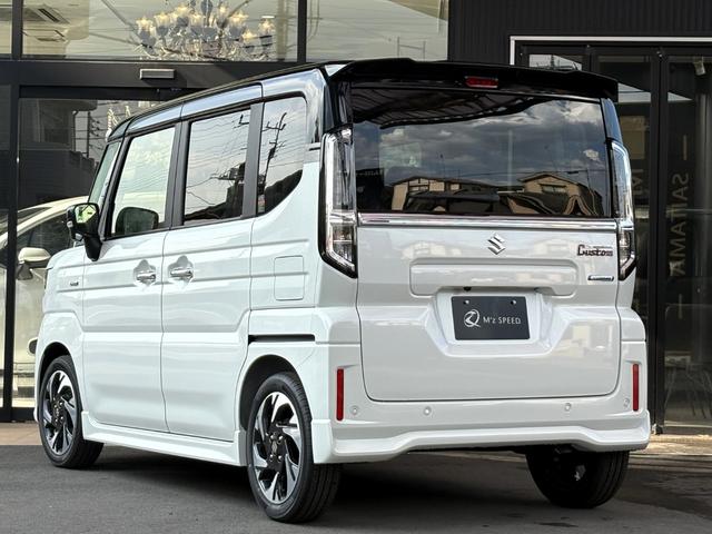 スペーシアカスタム ハイブリッドＸＳターボ　届出済未使用車　７月３０日登録全方位モニター付きメモリーナビゲーション　　スズキコネクト対応通信機装着車　後席両側パワースライドドア　フロント両席シートヒーター　９インチフルセグＴＶ　白×黒（15枚目）