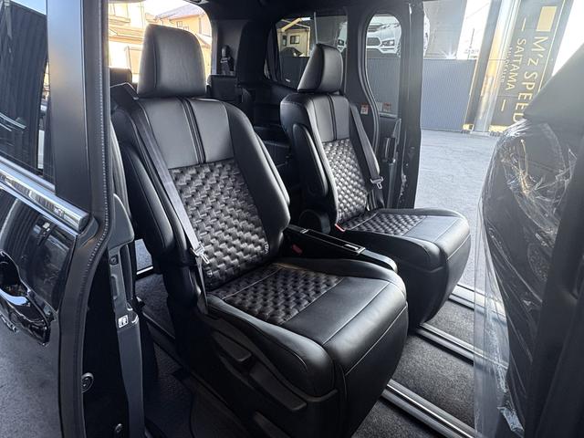 ヴォクシー ハイブリッドＳ－Ｚ　仕様変更後即　納　ＬＥＤヘッドランプ　快適利便Ｐｋｇ　ＣＤ／ＤＶＤデッキ　デジタルインナーミラー　ＥＴＣ２．０　２列目オットマン　パワーバックドア　バックカメラ　シートヒーター　１０．５型ディスプレイ（36枚目）