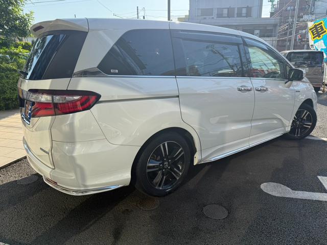 オデッセイハイブリッド ハイブリッドアブソルート・ホンダセンシングＥＸパック　７人乗／禁煙車／後席モニター／全周囲カメラ／両側電動スライド／純正ナビ／レーダークルーズ／ＵＳＢ入力／衝突軽減／ＤＶＤ＆ＣＤ再生／ブラインドスポット／Ｂｌｕｅｔｏｏｔｈ接続／オットマン／ＥＴＣ（11枚目）