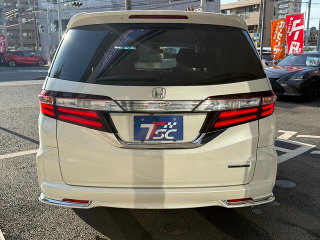 オデッセイハイブリッド ハイブリッドアブソルート・ホンダセンシングＥＸパック　７人乗／禁煙車／後席モニター／全周囲カメラ／両側電動スライド／純正ナビ／レーダークルーズ／ＵＳＢ入力／衝突軽減／ＤＶＤ＆ＣＤ再生／ブラインドスポット／Ｂｌｕｅｔｏｏｔｈ接続／オットマン／ＥＴＣ（29枚目）