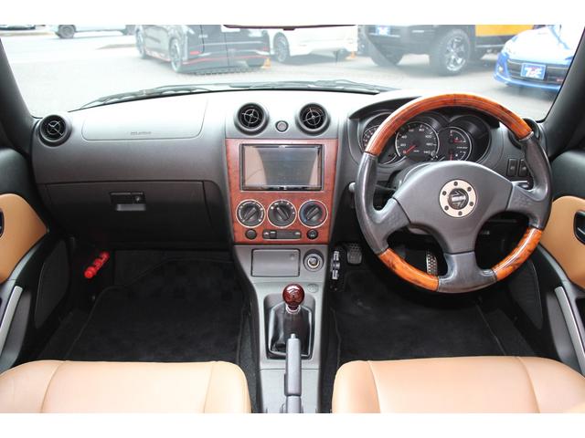 コペン タンレザーエディション　禁煙車／５ＭＴ／ターボ付き／タンレザーシート／オープン／ＣＣスポーツエアロ（Ｆ・Ｒ）／純正ＭＯＭＯウッドコンビハンドル／前席シートヒーター／社外１５インチアルミホイール／Ｂｌｕｅｔｏｏｔｈ接続／ＥＴＣ（5枚目）