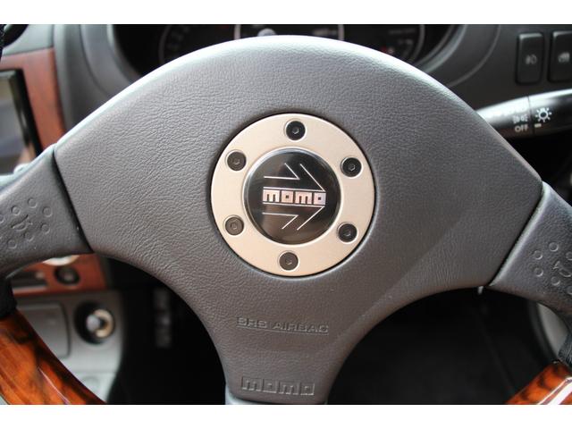 コペン タンレザーエディション　禁煙車／５ＭＴ／ターボ付き／タンレザーシート／オープン／ＣＣスポーツエアロ（Ｆ・Ｒ）／純正ＭＯＭＯウッドコンビハンドル／前席シートヒーター／社外１５インチアルミホイール／Ｂｌｕｅｔｏｏｔｈ接続／ＥＴＣ（13枚目）