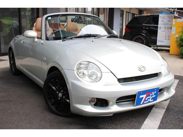 コペン タンレザーエディション　禁煙車／５ＭＴ／ターボ付き／タンレザーシート／オープン／ＣＣスポーツエアロ（Ｆ・Ｒ）／純正ＭＯＭＯウッドコンビハンドル／前席シートヒーター／社外１５インチアルミホイール／Ｂｌｕｅｔｏｏｔｈ接続／ＥＴＣ（15枚目）