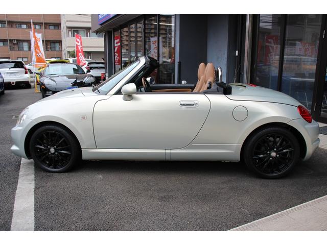 コペン タンレザーエディション　禁煙車／５ＭＴ／ターボ付き／タンレザーシート／オープン／ＣＣスポーツエアロ（Ｆ・Ｒ）／純正ＭＯＭＯウッドコンビハンドル／前席シートヒーター／社外１５インチアルミホイール／Ｂｌｕｅｔｏｏｔｈ接続／ＥＴＣ（20枚目）