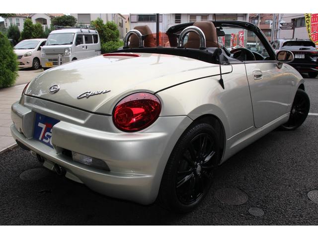 コペン タンレザーエディション　禁煙車／５ＭＴ／ターボ付き／タンレザーシート／オープン／ＣＣスポーツエアロ（Ｆ・Ｒ）／純正ＭＯＭＯウッドコンビハンドル／前席シートヒーター／社外１５インチアルミホイール／Ｂｌｕｅｔｏｏｔｈ接続／ＥＴＣ（21枚目）