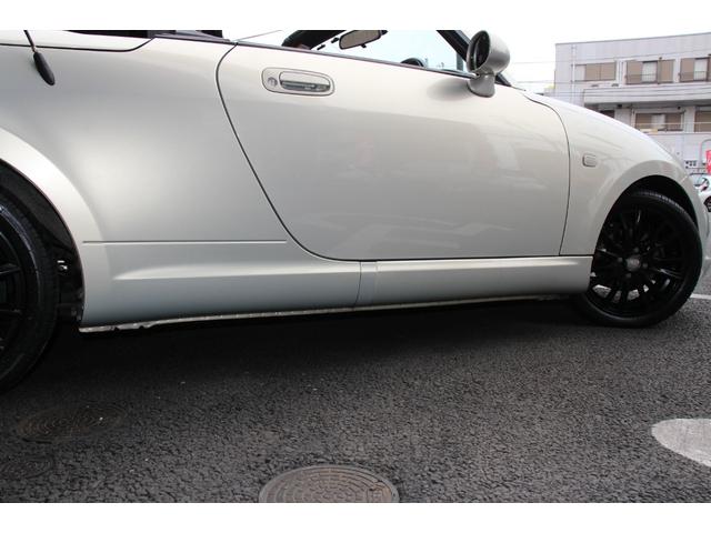 コペン タンレザーエディション　禁煙車／５ＭＴ／ターボ付き／タンレザーシート／オープン／ＣＣスポーツエアロ（Ｆ・Ｒ）／純正ＭＯＭＯウッドコンビハンドル／前席シートヒーター／社外１５インチアルミホイール／Ｂｌｕｅｔｏｏｔｈ接続／ＥＴＣ（22枚目）