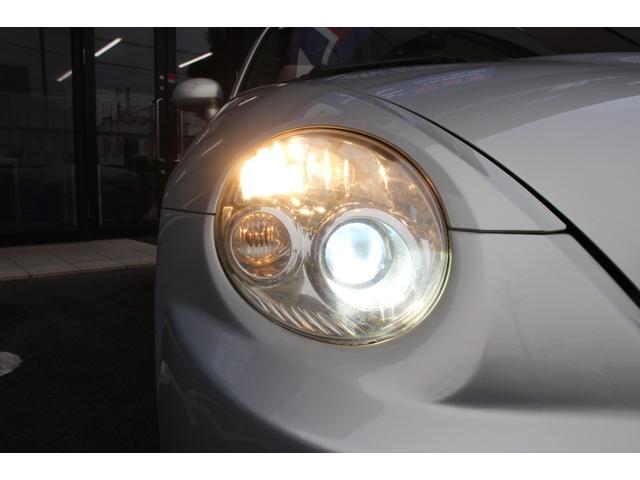 コペン タンレザーエディション　禁煙車／５ＭＴ／ターボ付き／タンレザーシート／オープン／ＣＣスポーツエアロ（Ｆ・Ｒ）／純正ＭＯＭＯウッドコンビハンドル／前席シートヒーター／社外１５インチアルミホイール／Ｂｌｕｅｔｏｏｔｈ接続／ＥＴＣ（32枚目）