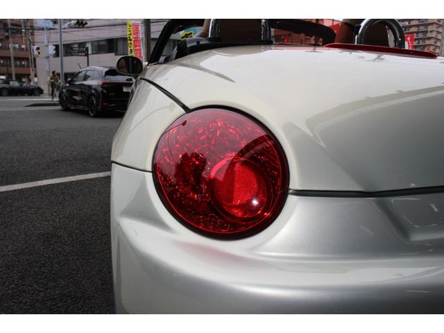 コペン タンレザーエディション　禁煙車／５ＭＴ／ターボ付き／タンレザーシート／オープン／ＣＣスポーツエアロ（Ｆ・Ｒ）／純正ＭＯＭＯウッドコンビハンドル／前席シートヒーター／社外１５インチアルミホイール／Ｂｌｕｅｔｏｏｔｈ接続／ＥＴＣ（38枚目）