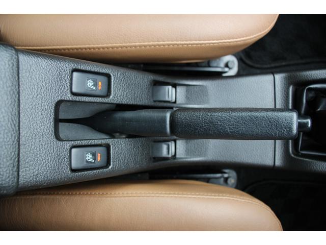 コペン タンレザーエディション　禁煙車／５ＭＴ／ターボ付き／タンレザーシート／オープン／ＣＣスポーツエアロ（Ｆ・Ｒ）／純正ＭＯＭＯウッドコンビハンドル／前席シートヒーター／社外１５インチアルミホイール／Ｂｌｕｅｔｏｏｔｈ接続／ＥＴＣ（57枚目）