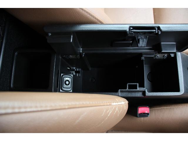 コペン タンレザーエディション　禁煙車／５ＭＴ／ターボ付き／タンレザーシート／オープン／ＣＣスポーツエアロ（Ｆ・Ｒ）／純正ＭＯＭＯウッドコンビハンドル／前席シートヒーター／社外１５インチアルミホイール／Ｂｌｕｅｔｏｏｔｈ接続／ＥＴＣ（58枚目）