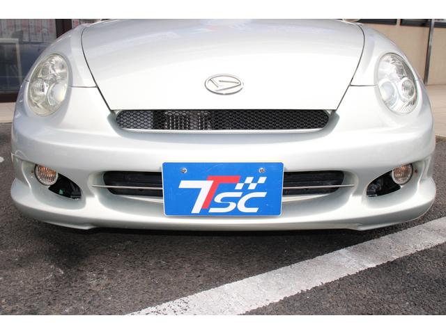 コペン タンレザーエディション　禁煙車／５ＭＴ／ターボ付き／タンレザーシート／オープン／ＣＣスポーツエアロ（Ｆ・Ｒ）／純正ＭＯＭＯウッドコンビハンドル／前席シートヒーター／社外１５インチアルミホイール／Ｂｌｕｅｔｏｏｔｈ接続／ＥＴＣ（66枚目）