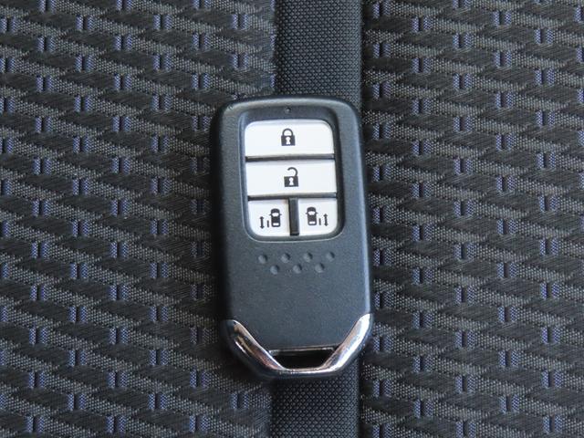 ステップワゴンスパーダ スパーダ 認定中古車 両側パワースライドドア 社外ナビ ETC バックカメラ クルーズコントロール イモビライザー アイドリングストップ ABS フルセグ CD/DVD再生 MS USB接続 Bluetooth(64枚目)