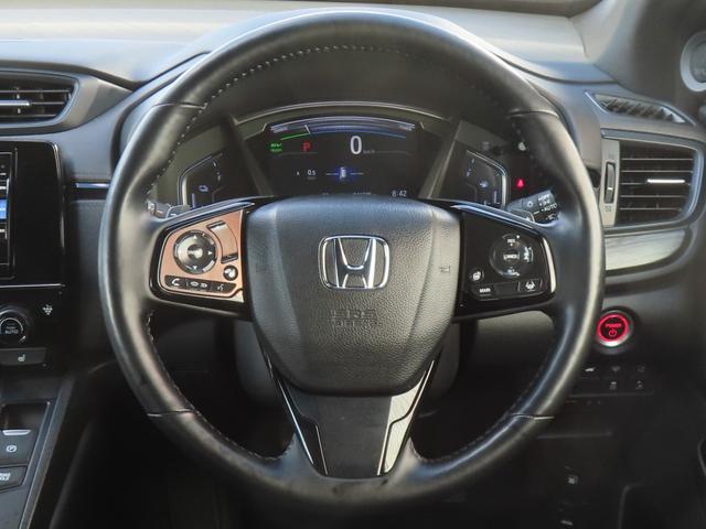 ＣＲ－Ｖハイブリッド ｅ：ＨＥＶＥＸ・ブラックエディション　認定中古車　サンルーフ　電子制御パーキングブレーキ　ブラインドスポットモニター　シートヒーター　純正ナビ　バックカメラ　ＥＴＣ　クルーズコントロール　イモビライザー　電動シート　純正アルミホイール（34枚目）
