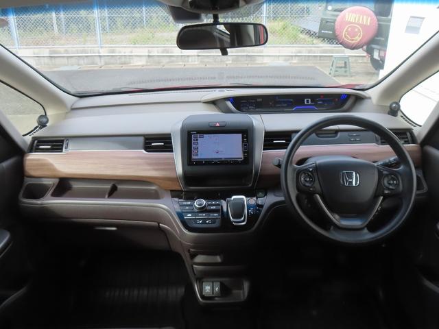 フリード+ハイブリッド ハイブリッドG・ホンダセンシング 認定中古車 両側パワースライドドア シートヒータ クルーズコントロール 純正ナビ ETC バックカメラ ホンダセンシング アイドリングストップ フルセグ CD/DVD再生 USB Bluetooth(13枚目)