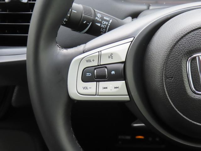 フィット ｅ：ＨＥＶホーム　認定中古車　電子制御パーキングブレーキ　ホンダコネクト対応ナビ　ブラインドスポットモニター　全周囲カメラ　ＥＴＣ　クルーズコントロール　イモビライザー　ＡＢＳ　フルセグ　ＵＳＢ　Ｂｌｕｅｔｏｏｔｈ対応（28枚目）