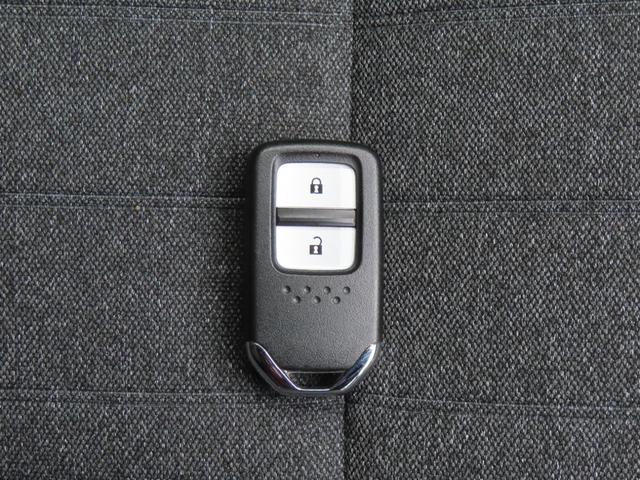 フィット ｅ：ＨＥＶホーム　認定中古車　電子制御パーキングブレーキ　ホンダコネクト対応ナビ　ブラインドスポットモニター　全周囲カメラ　ＥＴＣ　クルーズコントロール　イモビライザー　ＡＢＳ　フルセグ　ＵＳＢ　Ｂｌｕｅｔｏｏｔｈ対応（51枚目）