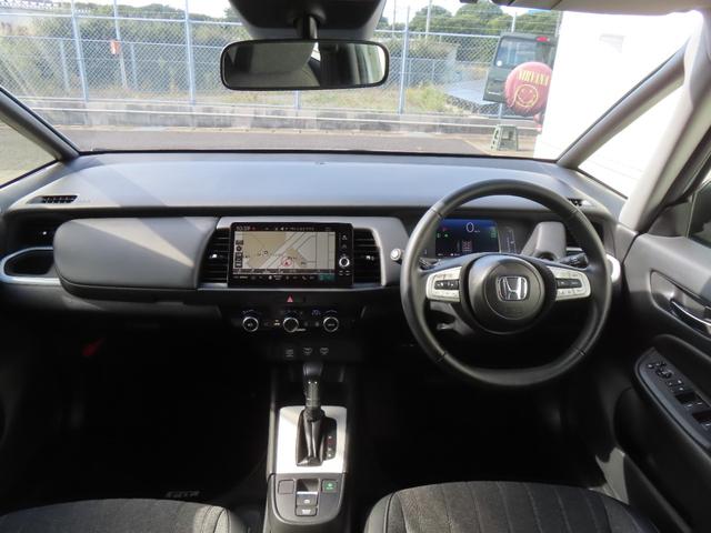 フィット ｅ：ＨＥＶホーム　認定中古車　電子制御パーキングブレーキ　ホンダコネクト対応ナビ　ブラインドスポットモニター　全周囲カメラ　ＥＴＣ　クルーズコントロール　ホンダセンシング　フルセグ　ＵＳＢ接続　Ｂｌｕｅｔｏｏｔｈ対応（13枚目）