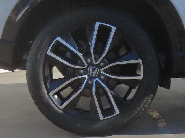 ヴェゼル ｅ：ＨＥＶＺ　認定中古車　ステアリングヒーター　電子制御パーキングブレーキ　シートヒーター　純正９インチナビ　バックカメラ　ＥＴＣ　クルーズコントロール　イモビライザー　純正アルミホイール　フルセグ　ＣＤ／ＤＶＤ（55枚目）