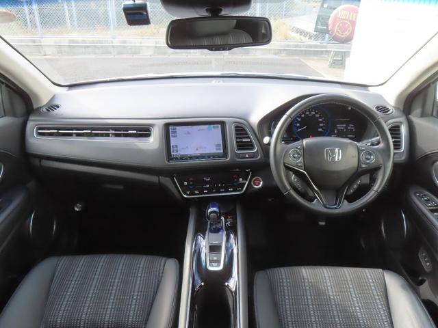 ヴェゼル ハイブリッドＺ・ホンダセンシング　認定中古車　ドライビングポジションシステム　電子制御パーキングブレーキ　８インチ純正ナビ　シートヒーター　ＥＴＣ　バックカメラ　ドライブレコーダー　イモビライザー　フルセグ　ＣＤ／ＤＶＤ再生（14枚目）
