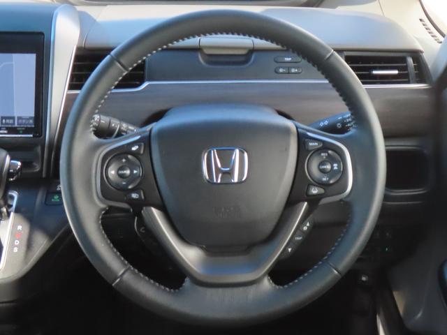 フリード Ｇ・ホンダセンシング　認定中古車　両側パワースライドドア　９インチ純正ナビ　バックカメラ　ＥＴＣ　クルーズコントロール　イモビライザー　ＡＢＳ　ＶＳＡ　純正アルミホイール　フルセグ　ＣＤ／ＤＶＤ再生　Ｂｌｕｅｔｏｏｔｈ対応（27枚目）