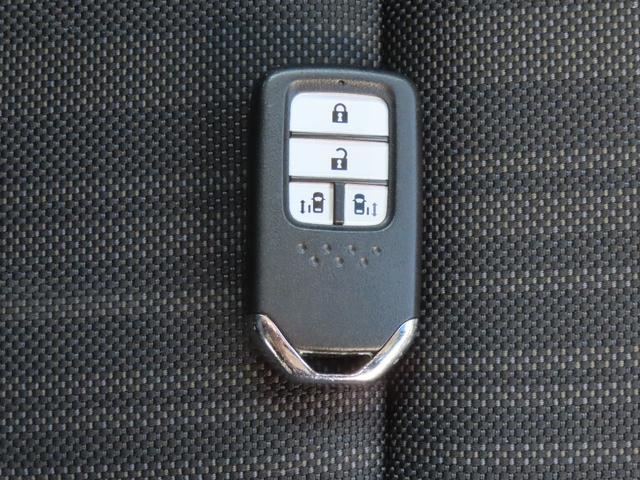 フリード Ｇ・ホンダセンシング　認定中古車　両側パワースライドドア　９インチ純正ナビ　バックカメラ　ＥＴＣ　クルーズコントロール　イモビライザー　ＡＢＳ　ＶＳＡ　純正アルミホイール　フルセグ　ＣＤ／ＤＶＤ再生　Ｂｌｕｅｔｏｏｔｈ対応（63枚目）