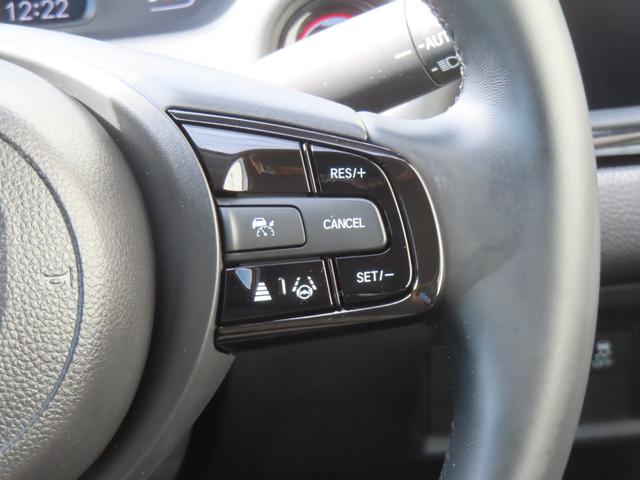 フィット ｅ：ＨＥＶホームブラックスタイル　認定中古車　電子制御パーキングブレーキ　９インチ純正ナビ　バックカメラ　ＥＴＣ　クルーズコントロール　イモビライザー　純正アルミホイール　ＡＢＳ　フルセグ　ＣＤ／ＤＶＤ　ＵＳＢ　Ｂｌｕｅｔｏｏｔｈ対応（29枚目）