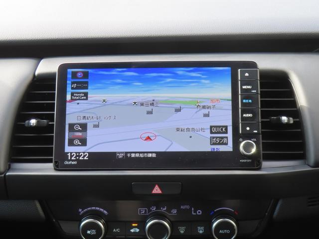 フィット ｅ：ＨＥＶホームブラックスタイル　認定中古車　電子制御パーキングブレーキ　９インチ純正ナビ　バックカメラ　ＥＴＣ　クルーズコントロール　イモビライザー　純正アルミホイール　ＡＢＳ　フルセグ　ＣＤ／ＤＶＤ　ＵＳＢ　Ｂｌｕｅｔｏｏｔｈ対応（37枚目）