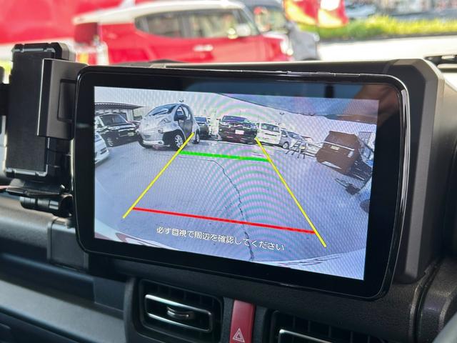 ジムニー ＸＣ　スマートキー２個　ＬＥＤヘッドライト　ＬＥＤフォグ　前後バンパー＆フロントグリル同色塗装　フェンダーモール　社外スペアタイヤカバー　社外９インチナビ　フルセグ　ＤＶＤ　ＢＴ　バックモニター（22枚目）